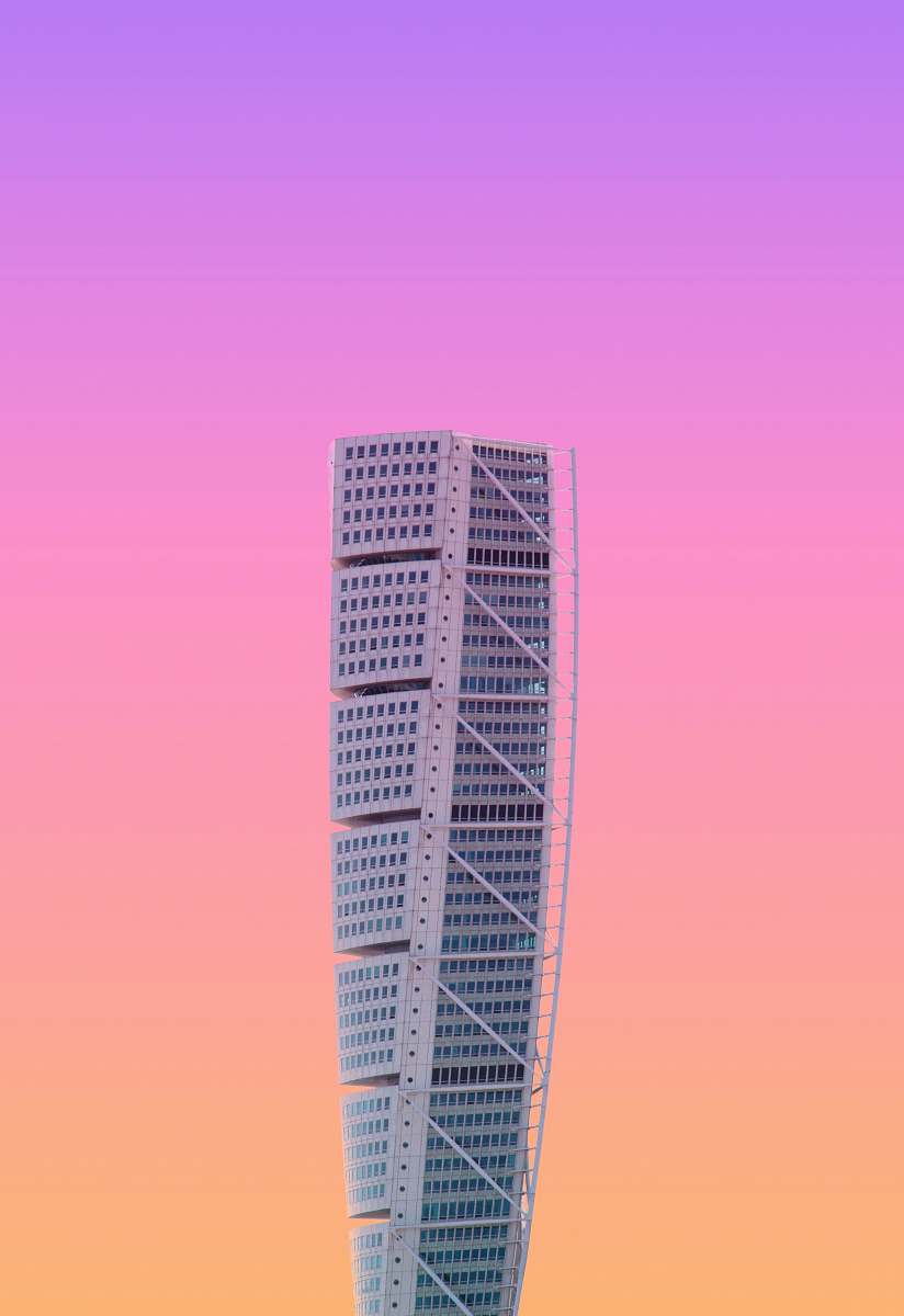 high rise white high-rise building under a purple sky town